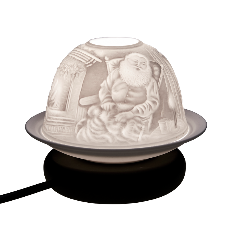 Father Christmas resting by the fire